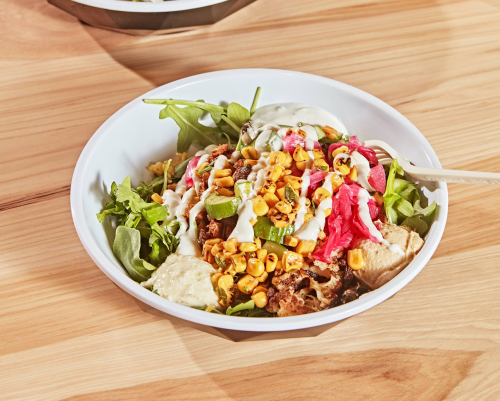 Cava salad bowl on wooden table