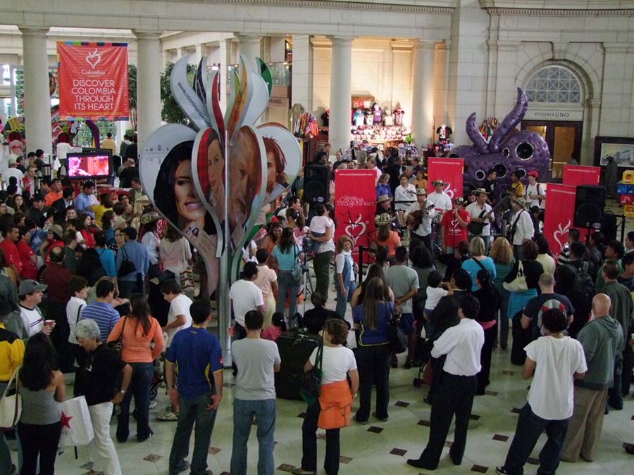 Crowd within Union Station with festive mood.