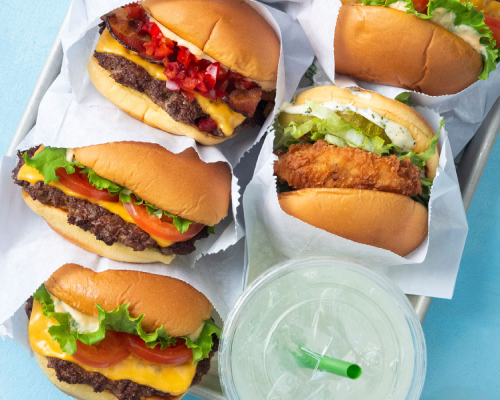 Shake Shack burgers and drink.
